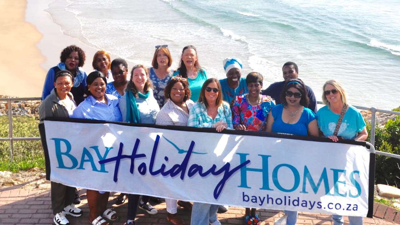 Bay Holiday Homes team photo showing the entire team